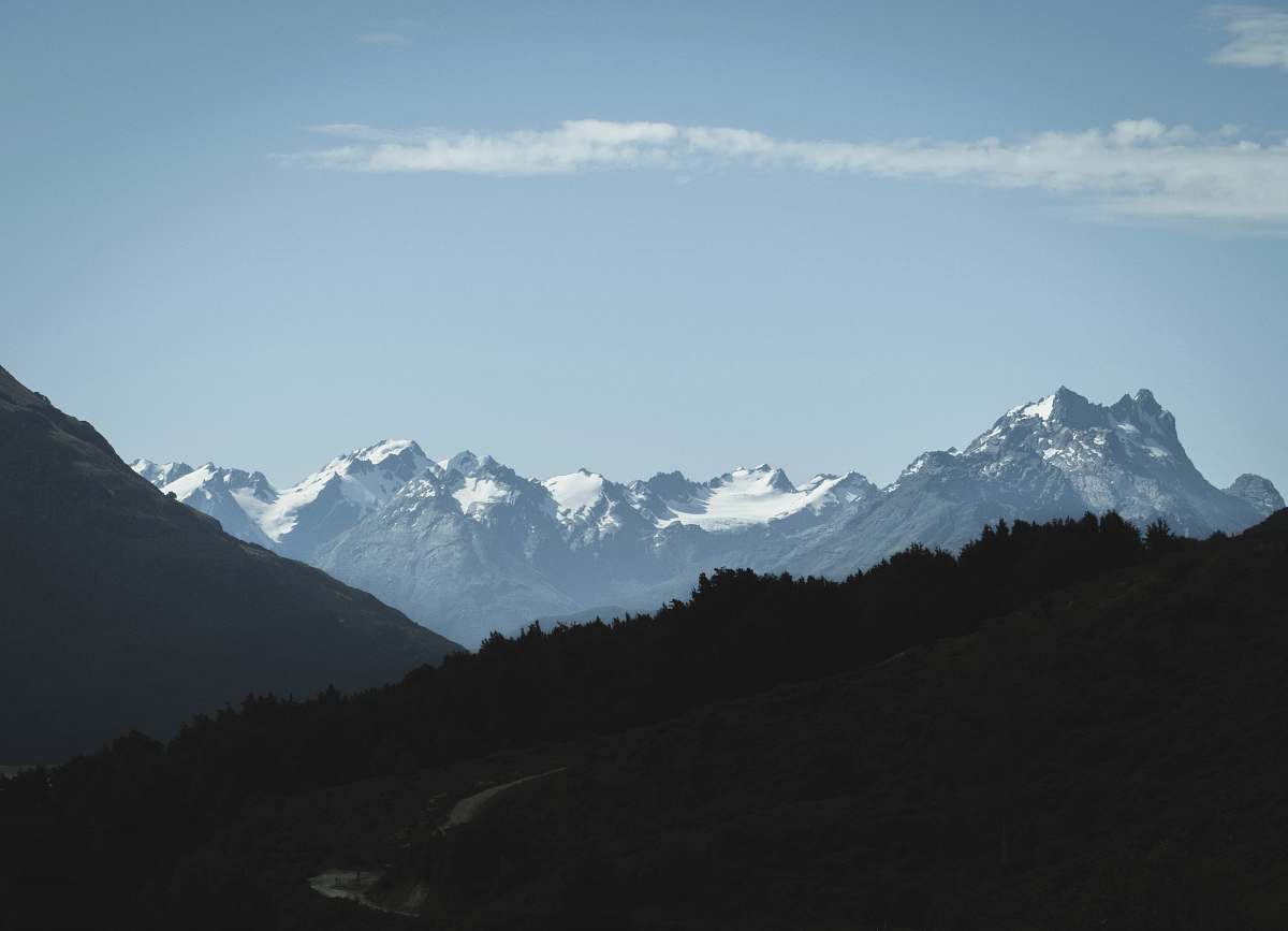 mountain range photo of mountain during daytime peak